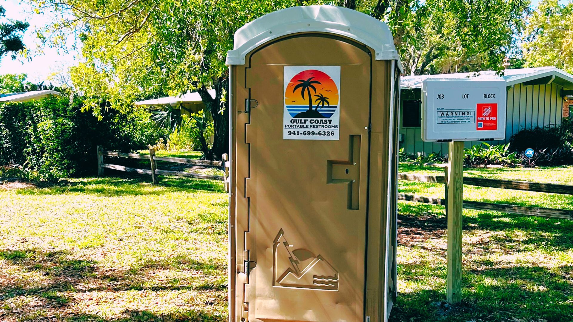 construction site in hendry county florida with porta potty